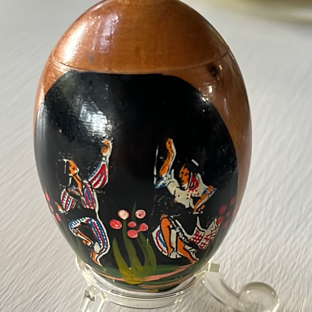 Wooden hollowed egg with painted dancers